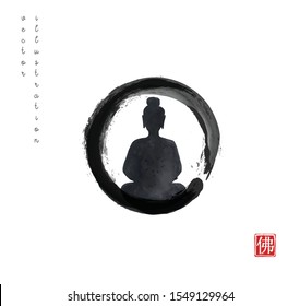 Silhouette of meditating Buddha in black enso zen circle on white background. Hieroglyph - Buddha. Traditional Japanese ink wash painting sumi-e. 