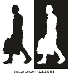 silhouette of men walking in black and white
