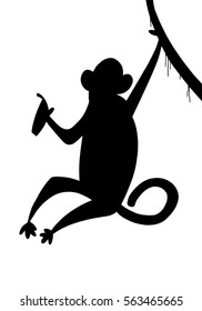 Silhouette of a monkey on a vine