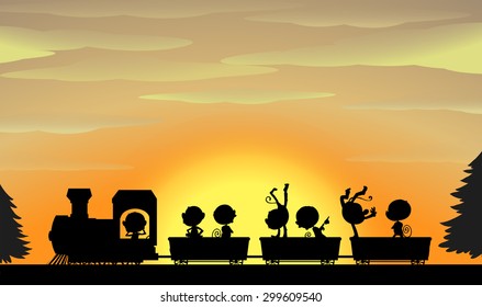 Silhouette of monkeys sitting on a train with sunset in the background