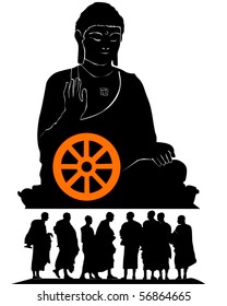 Silhouette of a monument of the Buddha with group of monks