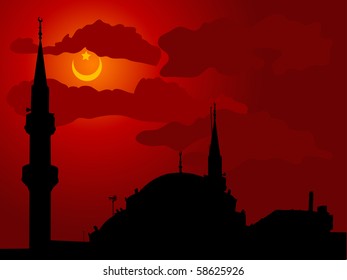 Silhouette of mosque against cloudy night sky