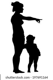 Silhouette of a mother and daughter on the walk