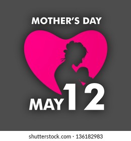 Silhouette of a mother with her child in pink heart with text May 12 for celebration of Happy Mothers Day.