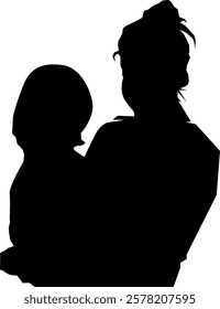 Silhouette of a mother holding her baby daughter