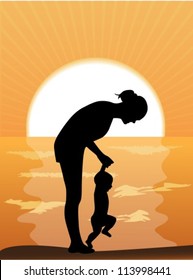 Silhouette mother leads the child's hands in the sunset by the sea