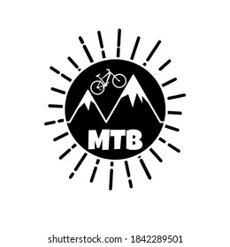 Silhouette of mountain bike symbol inside a circle with sunburst light, mountain symbol and MTB letters. Suitable for backgrounds, logos, icons, t-shirts, badges, stickers and emblems.
