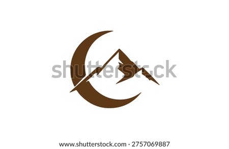 The silhouette of a mountain range at night with a crescent moon in the background creates a breathtaking scenery. The dark brown silhouette of the mountains stands out against the white background, evoking a sense of adventure and exploration. The crescent moon adds a touch of serenity to the image, making it perfect for landscape photography enthusiasts.