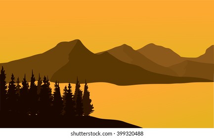 Silhouette of mountain at sunset and river