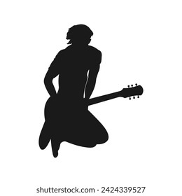 silhouette music. guitar musician. man jumping at concert. stringed instrument. rock music. expressive.