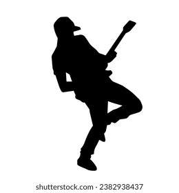 Silhouette of a musician playing electric guitar musical instrument. Silhouette of a male guitar player performing.