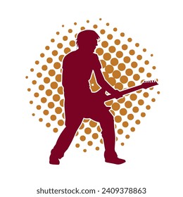 Silhouette of a musician playing electric guitar musical instrument. Silhouette of a male guitar player performing.