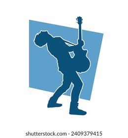 Silhouette of a musician playing electric guitar musical instrument. Silhouette of a male guitar player performing.