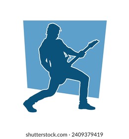 Silhouette of a musician playing electric guitar musical instrument. Silhouette of a male guitar player performing.