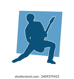 Silhouette of a musician playing electric guitar musical instrument. Silhouette of a male guitar player performing.