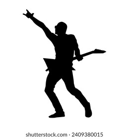 Silhouette of a musician playing electric guitar musical instrument. Silhouette of a male guitar player performing.