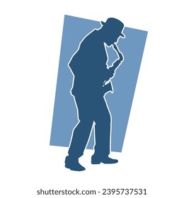 Silhouette of a musician playing saxophone music instrument. 