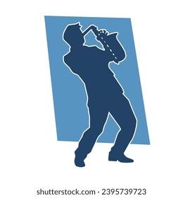 Silhouette of a musician playing saxophone music instrument. 