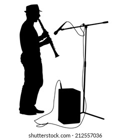 Silhouette musician plays the clarinet. Vector illustration.