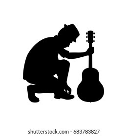 Silhouette musician plays the guitar. Vector illustration.