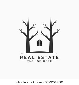 Silhouette nature wooden tree with home house building logo design