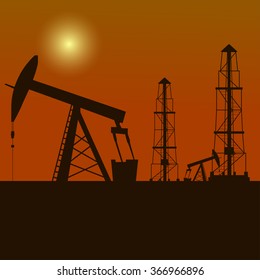 Silhouette of oil derrick