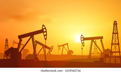  Silhouette Oil pumps at oil field with sunset sky background