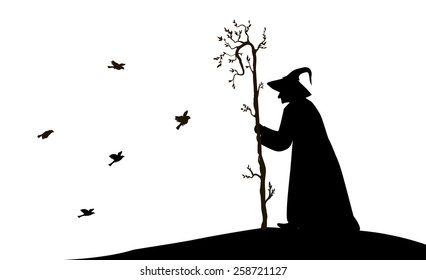 silhouette of  old enchantress with tree stick and flying sparrow on white background