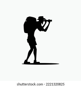 Silhouette Of An Old Man Hiker Observing The Journey Through Binoculars.