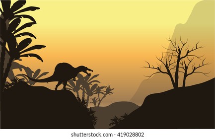 Silhouette of one spinosaurus in hills at the sunset