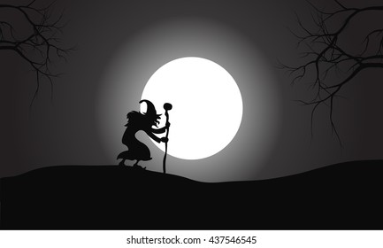 Silhouette of one witch and full moon