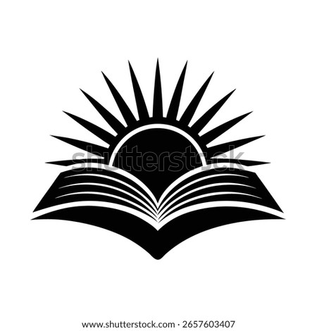 Silhouette an open book with sun rays emerging from behind sunrise
