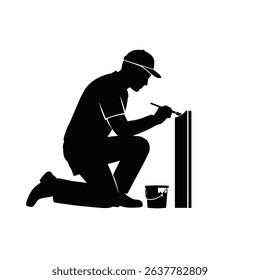 Silhouette of Painter Detailing Baseboard Trim - Precision Work