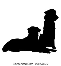 A silhouette of a pair of dogs. One is lying down and the other is sitting