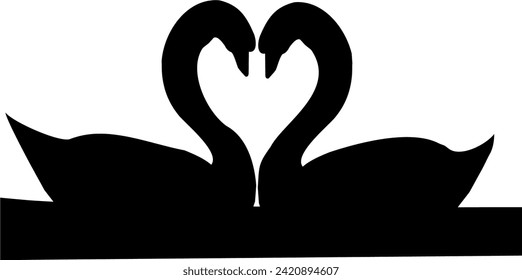 The silhouette of a pair of swans makes a symbol of love.