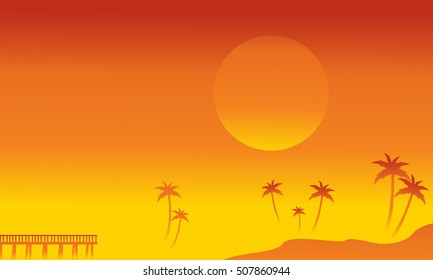 Silhouette of palm and pier
