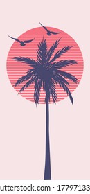 Silhouette of a palm tree on sunset	