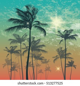 Silhouette of palm tree and sunset sky