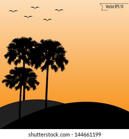 Silhouette of Palm tree at sunset. Vector. eps 10