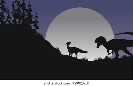Silhouette of Parasaurolophus and Allosaurus at the night