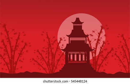 Silhouette of pavilion with bamboo background