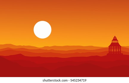 Silhouette of pavilion on desert landscape