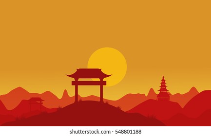 Silhouette of pavilion on hill at sunset