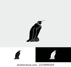 silhouette of a penguin incubating an egg for a logo