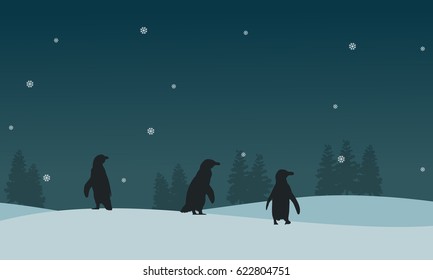 Silhouette of penguin on ice scenery