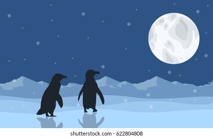 Silhouette of penguin on snow with moon scenery