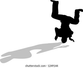 silhouette of person breakdancing