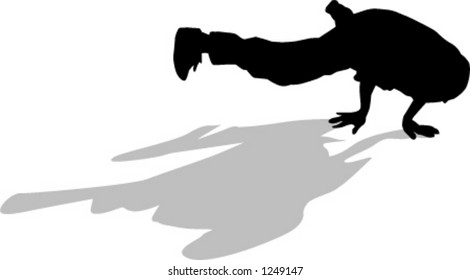 silhouette of person breakdancing