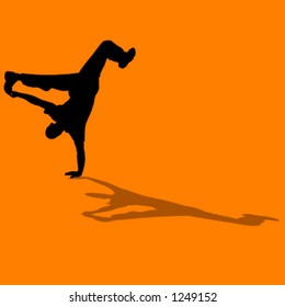 silhouette of person breakdancing