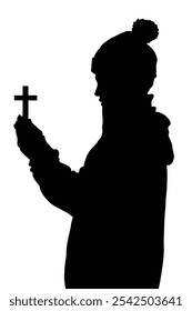 silhouette of a person with a cross